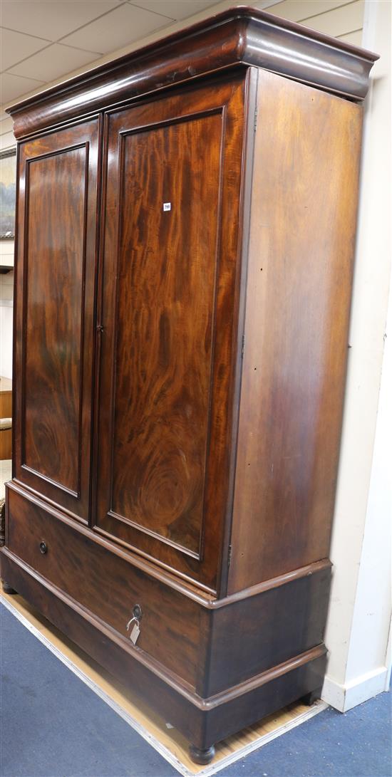 A Victorian mahogany linen press fitted sliding trays W.140cm